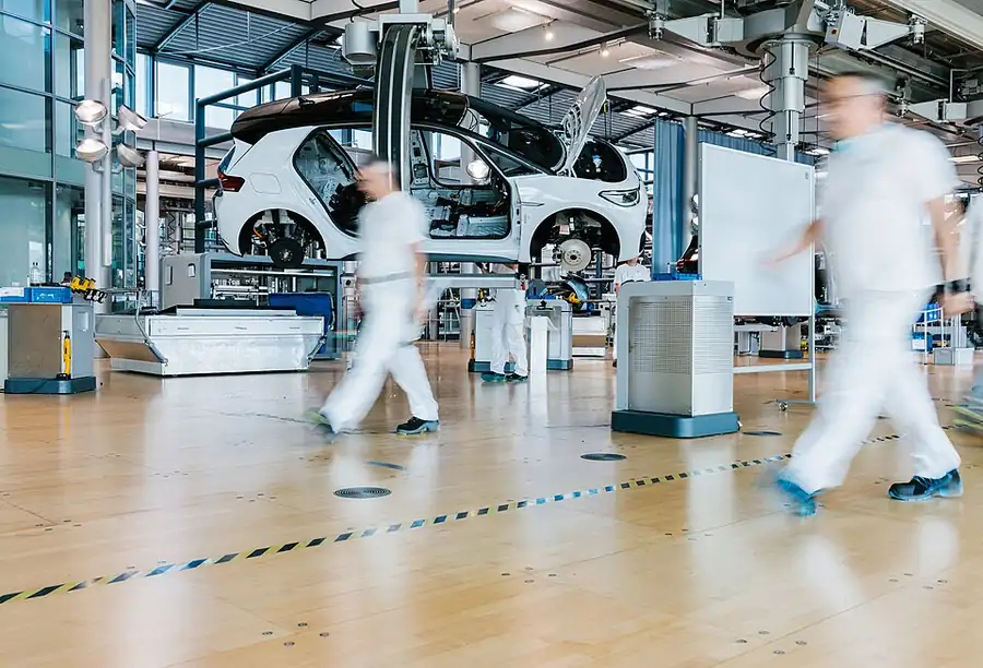 Volkswagen ID.3 production staff at the Gläserne Manufaktur in Dresden, Germany, 2021.
