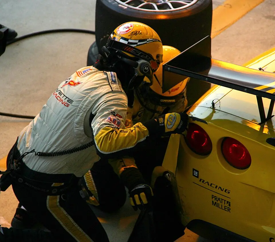 Mechanics work on a Corvette C6-R during practice at the 2006 24 Hours of Le Mans, France.