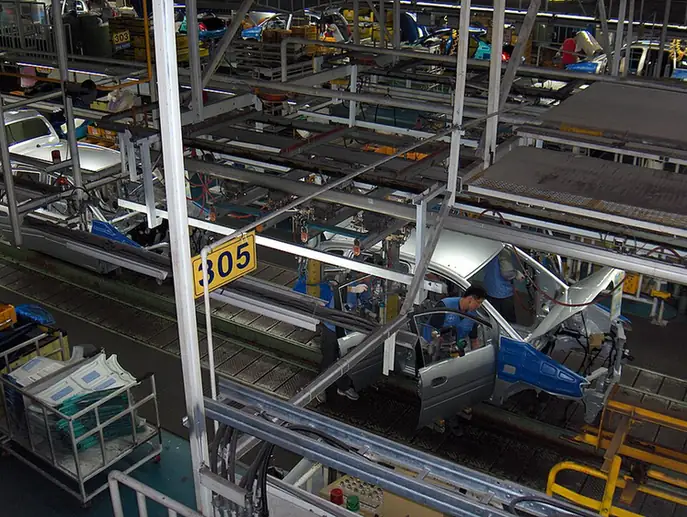 Workers on Hyundai’s vehicle assembly line in Ulsan, South Korea, July 2006.